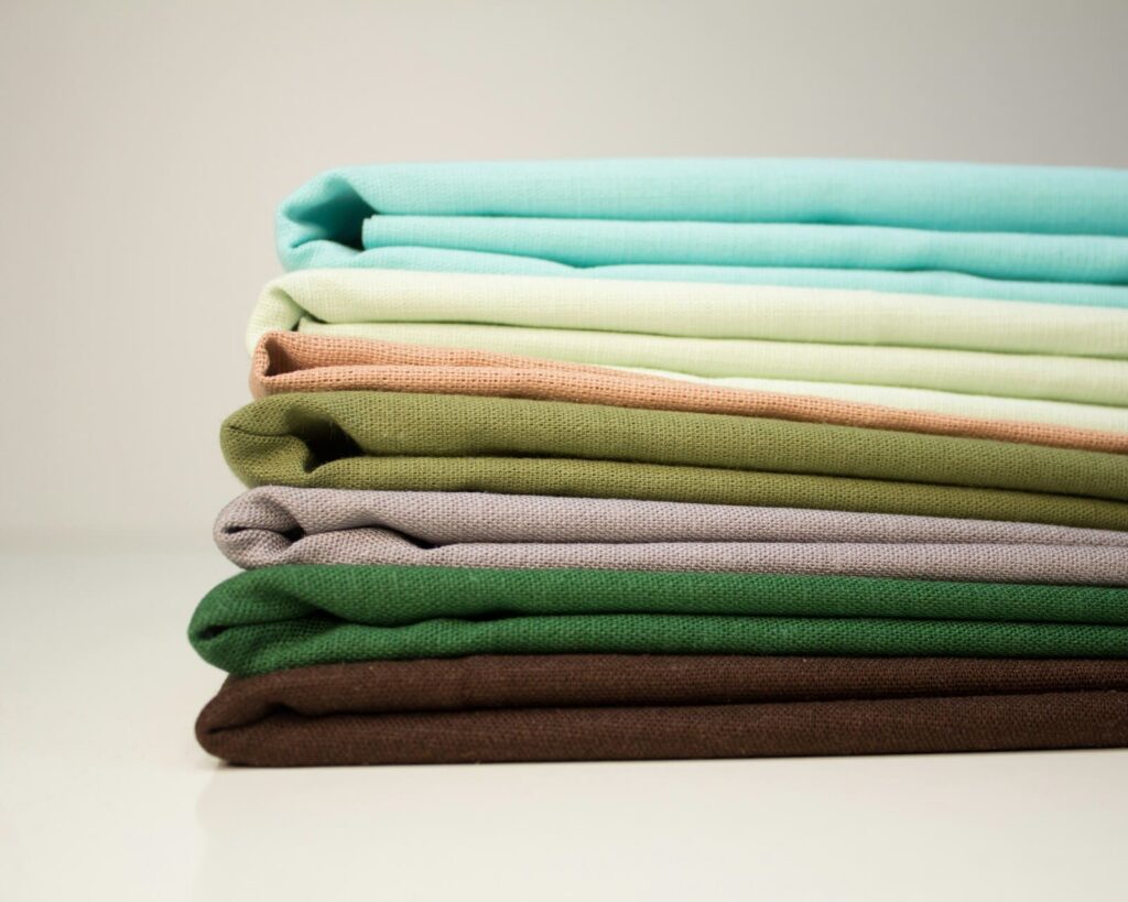 Stack of teal/mint fabric