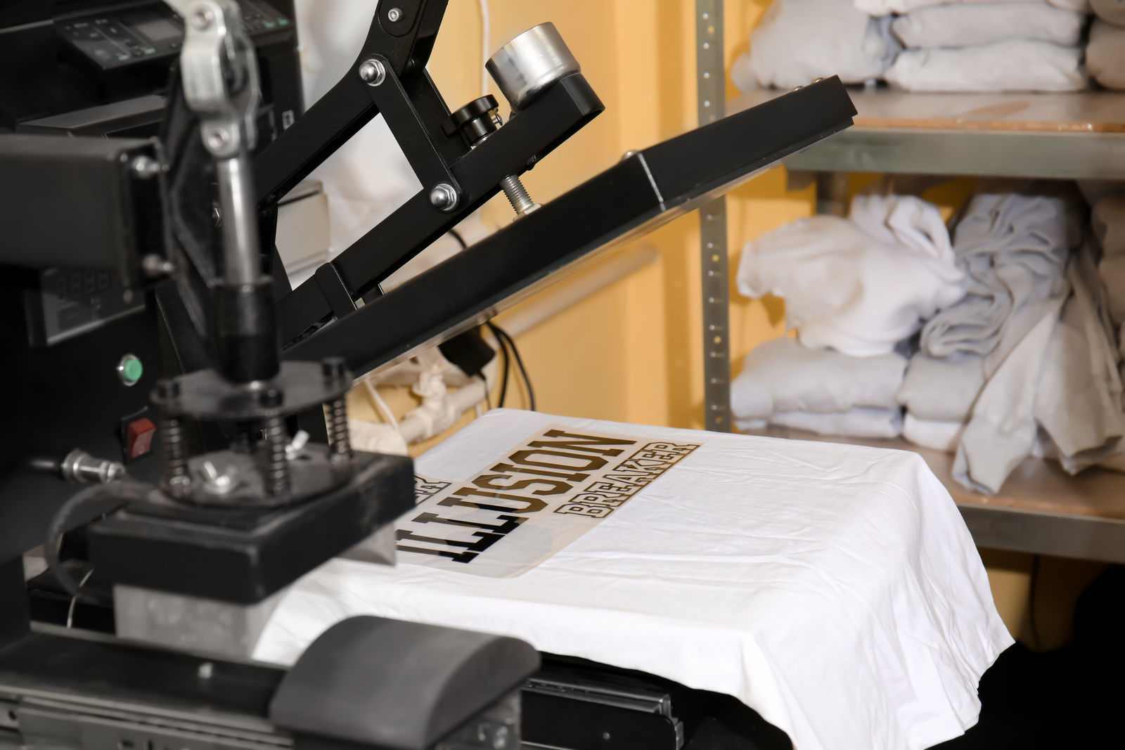 Heat press machine on white shirt